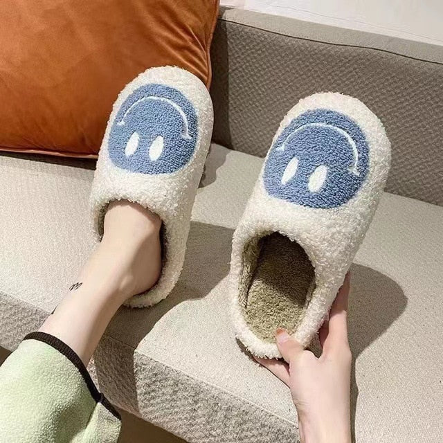 MEGA SMILEY FACE FUZZY SLIPPERS