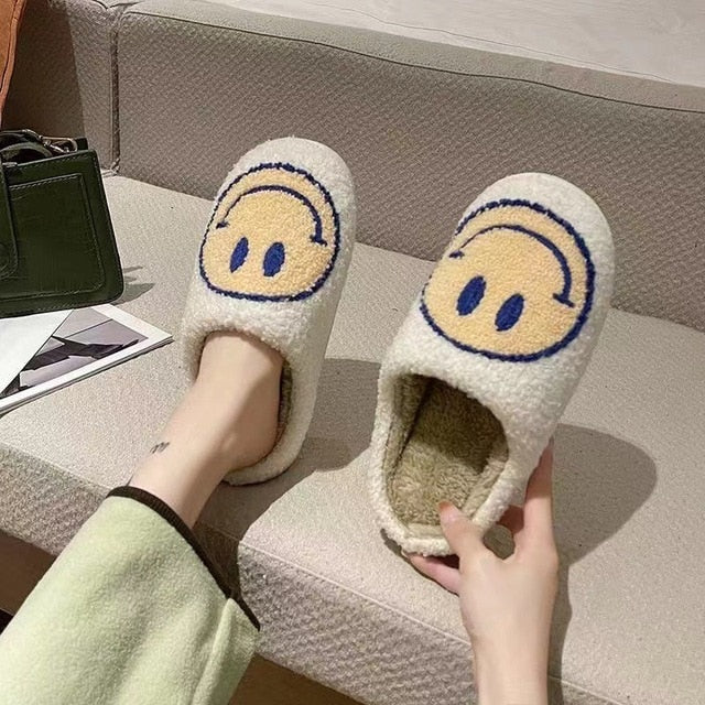 MEGA SMILEY FACE FUZZY SLIPPERS