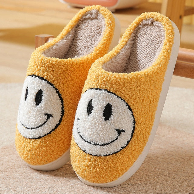 MEGA SMILEY FACE FUZZY SLIPPERS